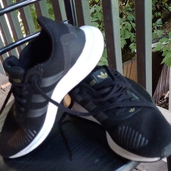 Adidas Black and White Sneakers with Modern Silhouette - Picture 8 of 9